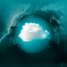 A magnified cloud on a green field enclosed by lightning and darker smoke