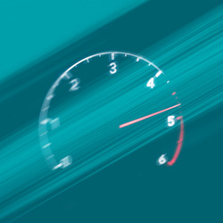 Speedometer on a green field