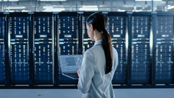 Woman with laptop in cybersecurity
